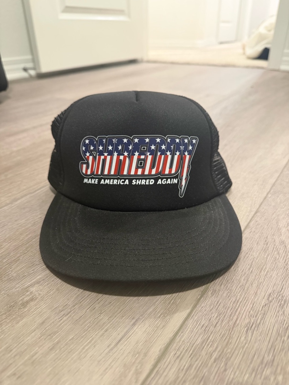 Black Trucker Cap with American Flag Logo
